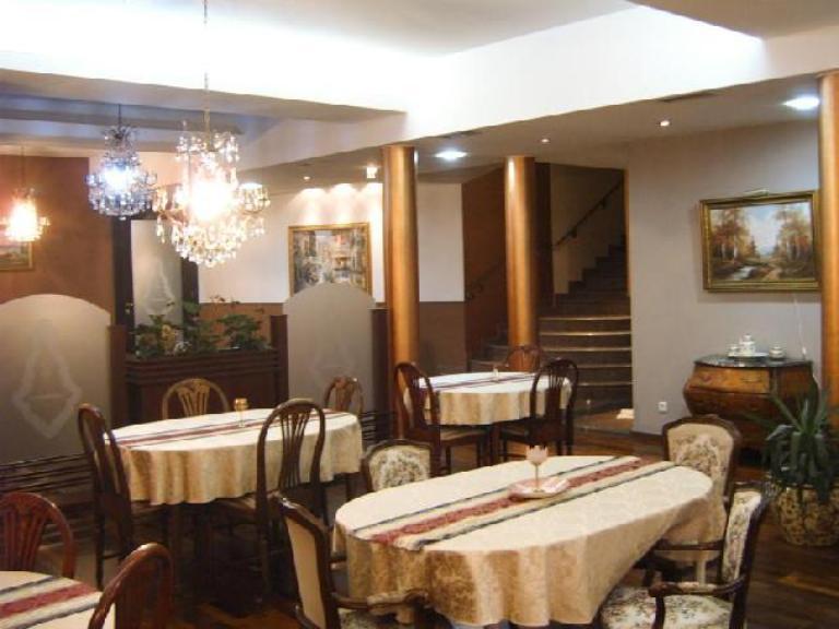 Hotel Octagon Сараево Ресторан фото